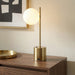Ethereal Modern Brass Globe Table Lamp | White Glass Orb & Brushed Gold Base | Ashcroft Imports Furniture