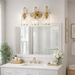 Twilight Vanity Light | Brushed Gold & Three-Light Clear Glass Design