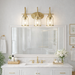 Twilight Vanity Light | Brushed Gold & Three-Light Clear Glass Design